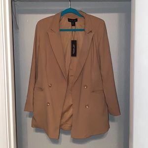 Tan blazer with shoulder padding